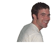 Tom Anderson in front of Myspace's Logo